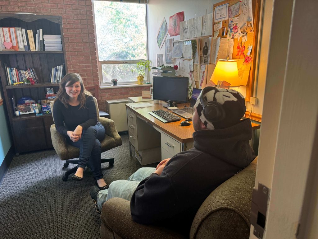 Theresa Hannegan meets with a young person in her office